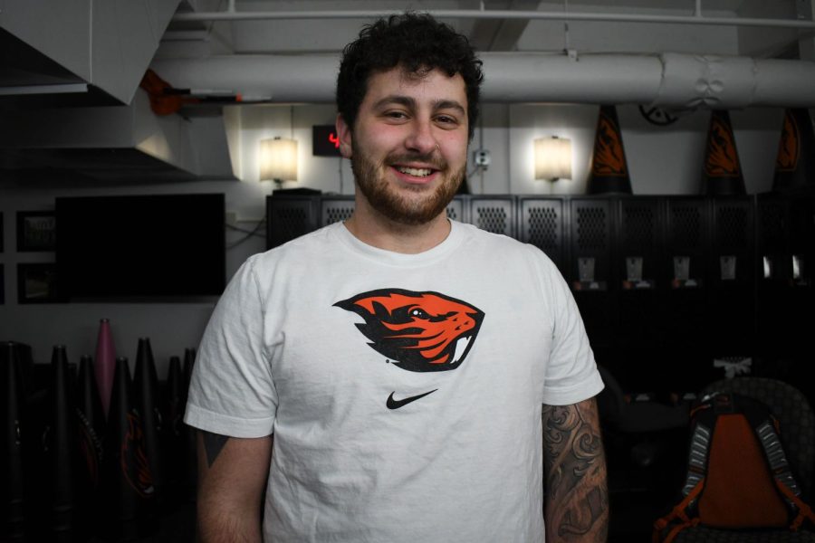 Oregon State University cheerleader
Oliver Cochener posing in the OSU cheer locker room in Corvallis, Ore. on March 30. Cochener is OSU’s first and only transgender cheerleader, and hopes to bring awareness towards transgender athletes around the country.