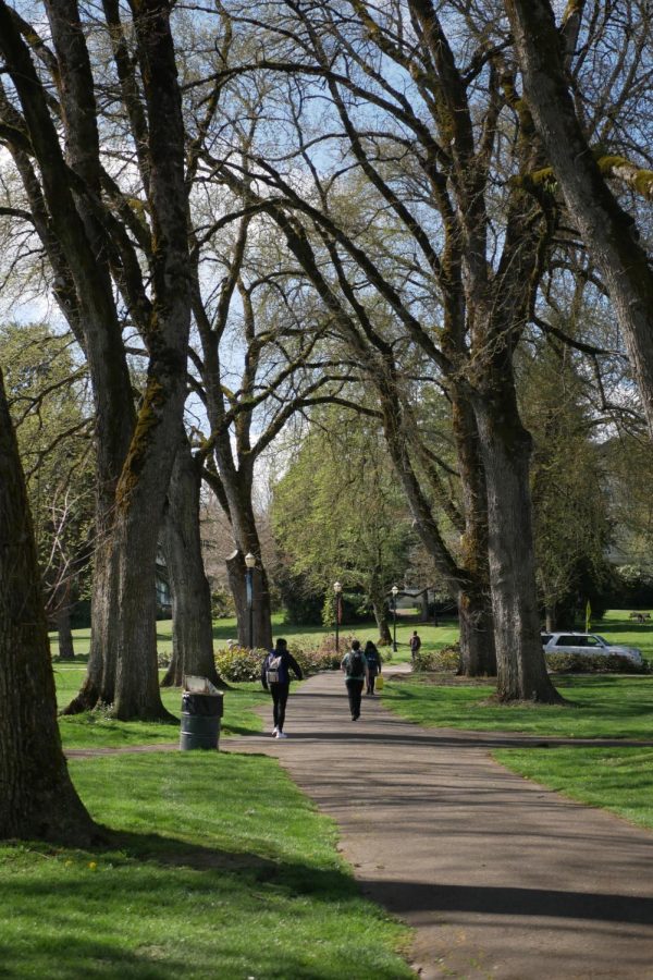 Students spend time walking through Oregon State University’s Corvallis, Ore. campus on March 30. This year, OSU will hosting a week of celebration for Earth Day that will include a Beyond Earth Day Community Fair on April 19.