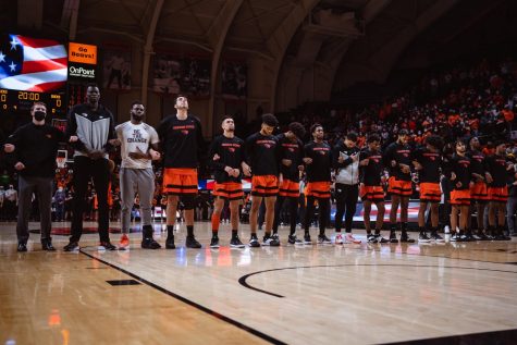 The Oregon State Mens basketball team is seen locking arms during the national anthem against the University of Oregon on Jan 10 inside of Gill Coliseum. The Beavers finished the season 3-28 after making it to the Elite Eight of the NCAA Tournament in the previous year.
