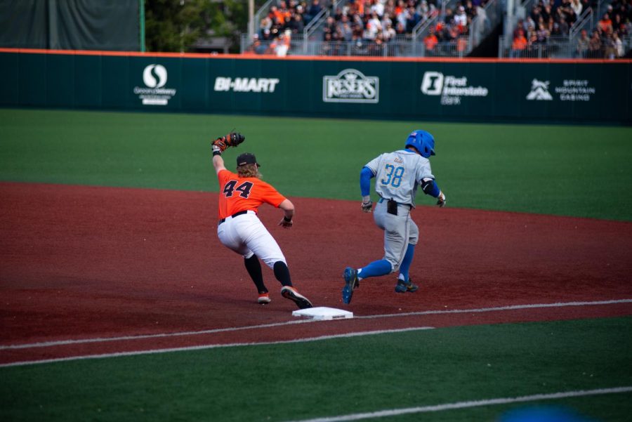 First baseman, redshirt-sophomore Garret Forrester, extends to catch the ball, resulting in an out against UCLA on May 20. The Beavers won the final game of the series against the Bruins by a score of 9-3 at Goss Stadium on May 21.