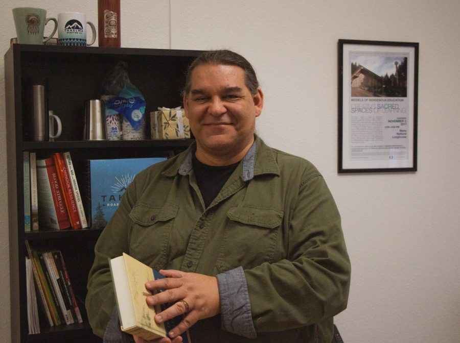 David Lewis, an assistant professor of anthropology and ethnic studies in the School of Language, Culture, & Society, in his office in Waldo Hall on May 6. Lewis is one of the professors spearheading the new Indigenous studies minor, which will allow OSU students to learn more about Indigenous culture, history, art and more. 