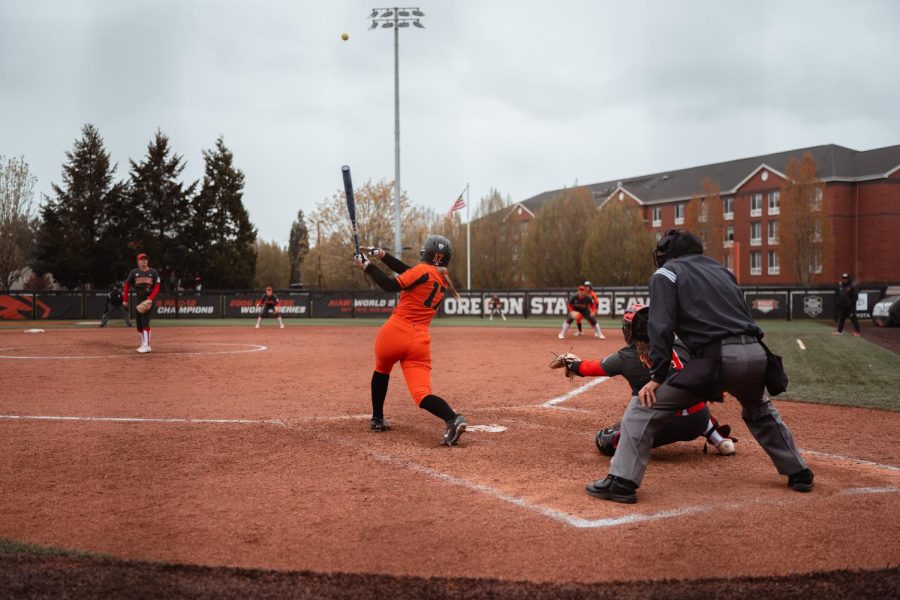 Sophomore+infielder%2C+Grace+Messmer%2C+sails+a+ball+into+the+outfield+against+Arizona+earlier+this+year+on+April+10th.+The+Beavers+won+the+first+game+against+the+Utah+Utes+today+to+start+the+final+series+of+the+regular+season.