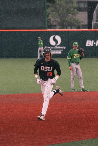 Oregon State junior outfielder/infielder Jacob Melton rounding the bases after hitting a home run against the University of Oregon Ducks on May 8 in Corvallis, Ore. Melton went 7-11 and hit two home runs, which helped the Beavers win the game 5-0, and sweep the in-state rival. 
