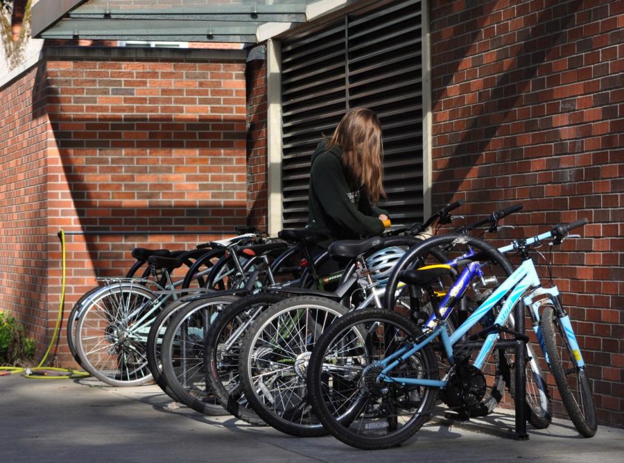 Bikes locked on the bike rack near the Student Experience Center at Oregon State University on May 31. Bikes are a common way to travel campus and ZAP encourages more people to bike for sustainability and health reasons.