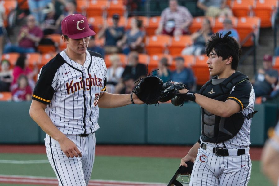 Matthew+Ager+celebrates+a+successful+inning+after+recording+a+strikeout+with+his+catcher%2C+Tyler+Quinn+against+the+Walla+Walla+Sweets+at+Goss+Stadium+in+Corvallis.+The+Sweets+won+the+game%2C+2-1.+