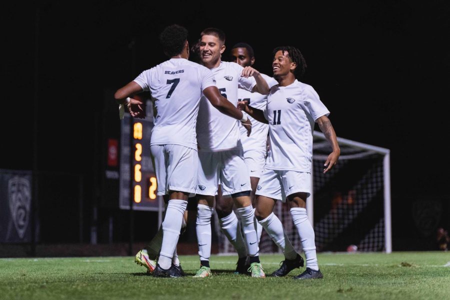 Sophomore Ellis Spikner celebrates his goal with his teammates in the Beavers’ first game of the season against UC Davis at Paul Lorenz Field on August 25, 2022. They started their season strong with a win.