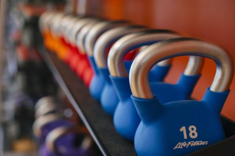 Kettlebell weights at Dixon Recreation
Center. In previous summer terms, only
enrolled students could utilize the Dixon
facilities, but this year any student can work
out for free.