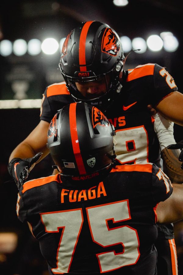 Taliese+Fuaga+and+Kanoa+Shannon+celebrate+Shannon%E2%80%99s+touchdown+during+the+Beaver+football+game+against+Montana+State+at+Providence+Park+in+Portland%2C+Ore%2C+on+September+17%2C+2022.+Five+different+Beavers+rushed+for+touchdowns+during+the+game.