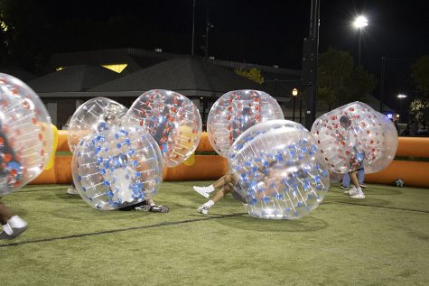 Oregon State University students play bubble soccer at the Great Bouncing Beaver Bash at Student Legacy Park on Friday, Sept. 23. The event took place as a way to get new students to interact and make new friends and celebrate the end of summer.