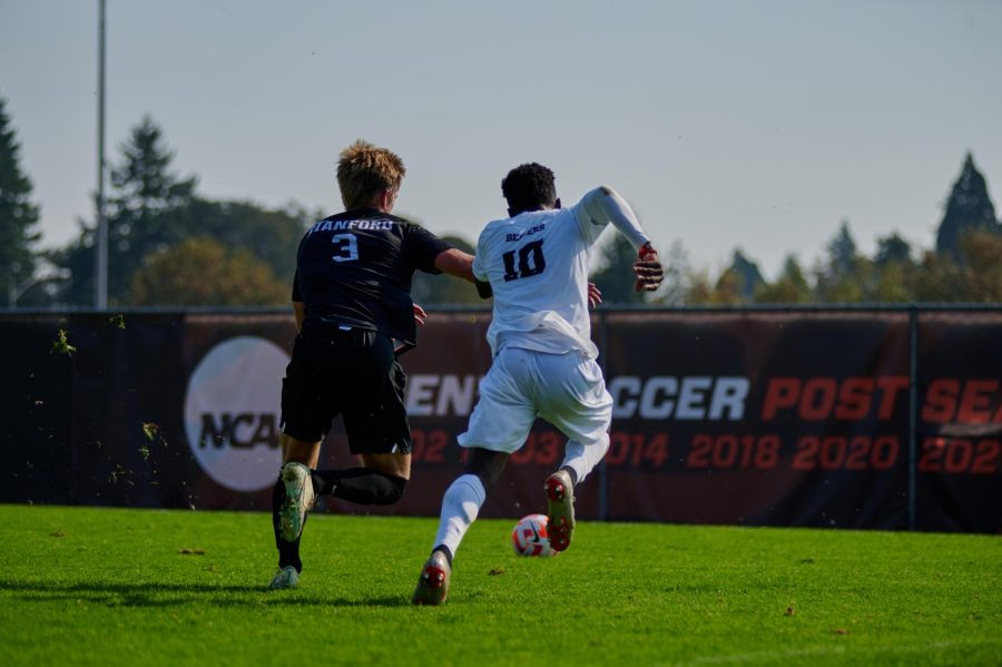 Oregon State University men’s soccer player, Mouhameth Thiam, sprints down the field in an attempt to beat Stanford men’s soccer player, Keegan Tingey, to the ball on Oct. 9 at Paul Lorenz Field. OSU men’s soccer faced off against Stanford with a final score of 2-2.