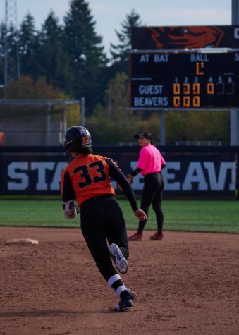 Junior utility player Madison Simon runs towards first pace in Saturdays game against Mt. Hood Community College. The Beavers won by a score of 13-4.