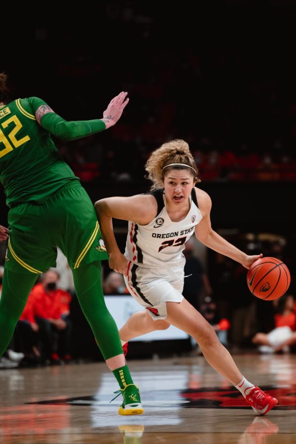 Talia Von Oelhoffen drives past on Oregon defender in matchup that took place last year in Gill Coliseum on Feb. 11. Oelhoffen led the Beavers in scoring today with a total of 23 points.