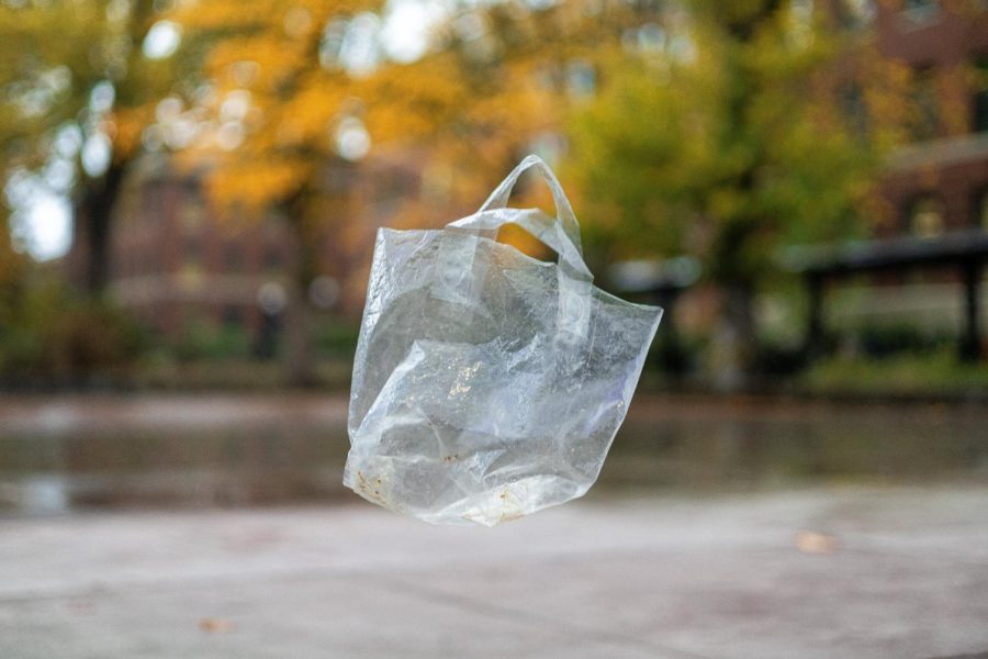 In this photo illustration, a plastic bag is depicted as drifting in the wind in the SEC Plaza on Nov. 1. OSU researchers are working with the department of energy to engineer microbes into a component for nylon production.
