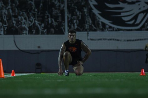 Lineback Kyrie Fisher-Morris prepares himself for the 40-yard dash during Mondays Pro Day drills. A total of 13 Beavers made their way through the drills in front of NFL professionals.
