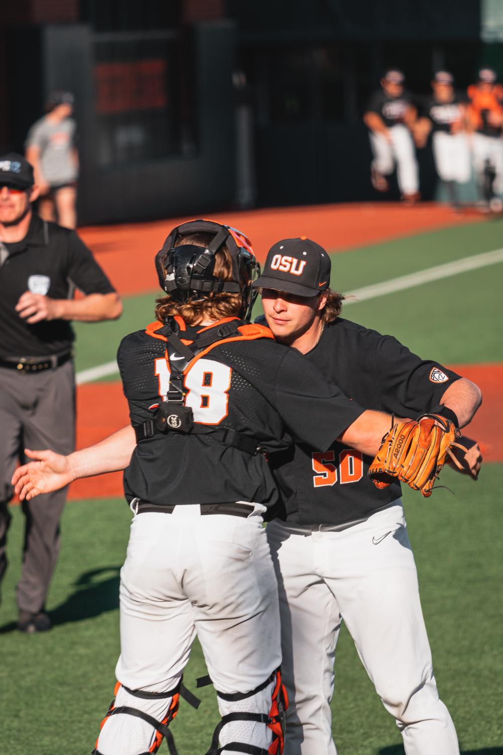 Ryan Brown #50 (right) hugs his catcher Wilson Weber #18 after the victory against the Arizona Wildcats at Goss Stadium in Corvallis on April 30. Brown was drafted by the Oakland Athletics in the 16th round of the 2023 MLB Draft. 