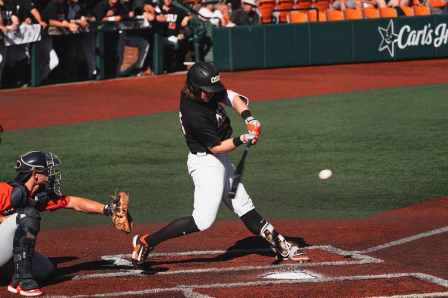 Garret Forrester swings at a pitch against the Arizona Wildcats at Goss Stadium in Corvallis on Saturday. Forrester was 1 for 3 with two runs and two walks in the game.