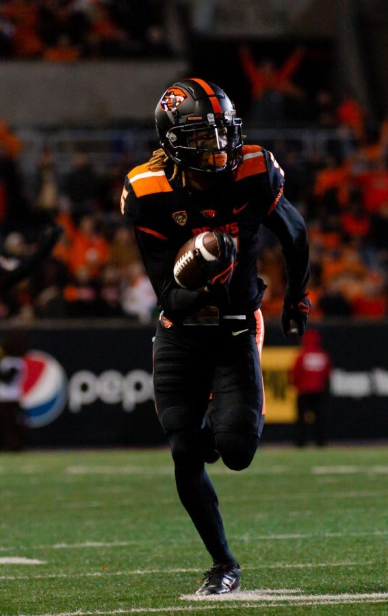 Defensive back Alex Austin runs the ball towards the end zone in the game against Colorado University on October 22, 2022 at Reser Stadium. Austin will be heading to the Buffalo Bills where Beaver alumni Jordan Poyer currently plays.