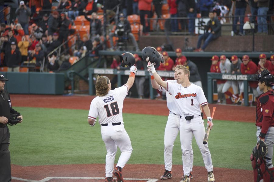 The Beavers celebrating their many hits of the game against USC on Friday, April 14th. 