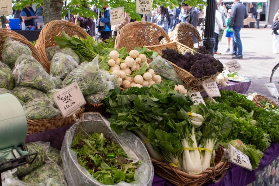 Vegetables+offered+for+sale+by+Gathering+Together+Farm+at+the+Corvallis+Farmers%E2%80%99+Market+on+May+6+in+downtown+Corvallis.+As+with+most+of+the+farms+at+the+Farmers%E2%80%99+Market%2C+Gathering+Together+Farm+felt+little+to+no+negative+effect+from+the+past+year%E2%80%99s+weather+trends.