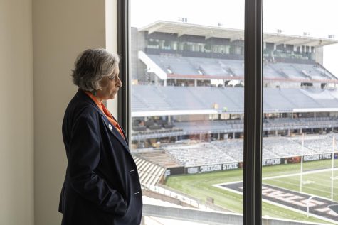 President of OSU Jayathi Murthy takes a moment to appreciate the view of Reser Stadium from an exam room during a tour of the new Health center located on the southwest side of campus on May 23. At its closest point, the new center is only 12 inches from Reser Stadium.