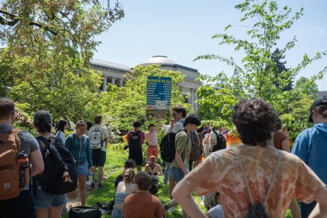 Students surround an evangelist preaching in the Memorial Union quad on May 15. 