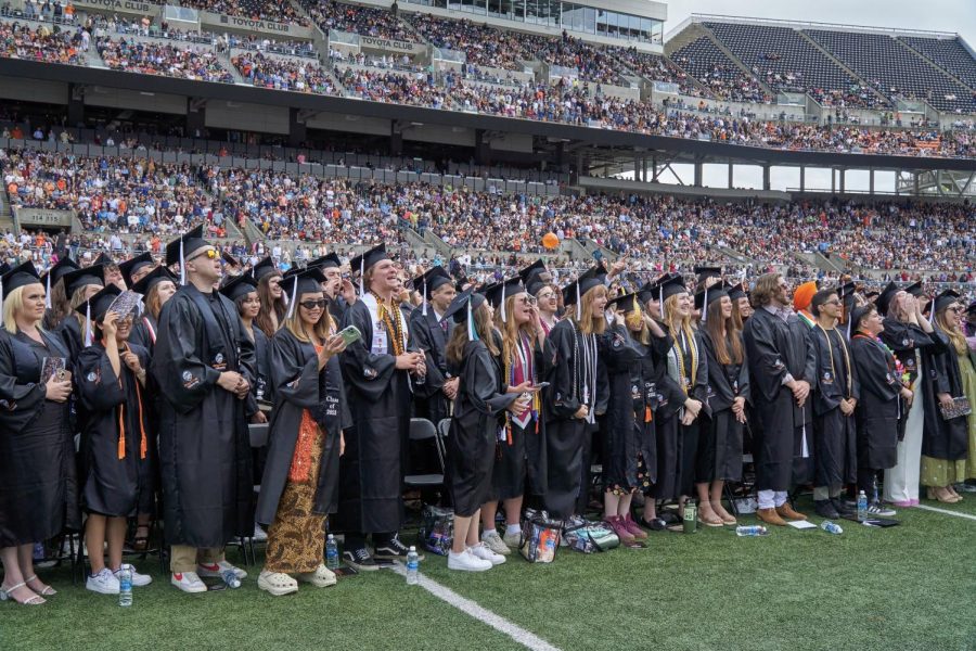 The class of 2023 screams “Go Beavs!” together as is tradition in Reser Stadium during the 2023 OSU Commencement ceremony on June 17. The strength of their voices could be heard from well outside the stadium.