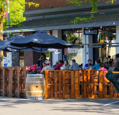 Many people attend dinner at Block 15 in downtown Corvallis on May 28.The additional outdoor seating selection was extended out from the sidewalk over a couple of parking spots and is expected to remain in that state over the summer. 