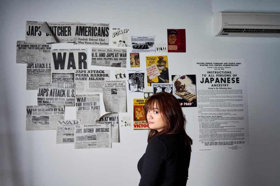 Allison Sakai standing in front of her installation titled “We Looked Like the Enemy”, hung in Snell Hall on June 2, 2023 in Corvallis. After receiving letters written by her grandmother, from her father, Allison quoted, “In my grandma’s writings, she included haikus that my great grandfather, Yempei Wake, wrote while he was incarcerated”.
