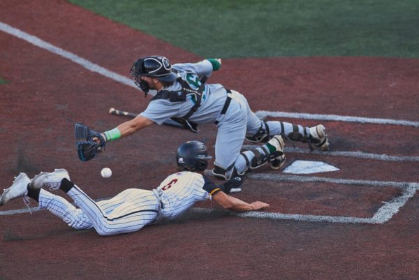 Phoenix Call, #6 of the Knights, slides into home base in the bottom of the second inning during the Knights vs. Pippins game on July 26. The Corvallis Knights up 1-0 during the
second inning.