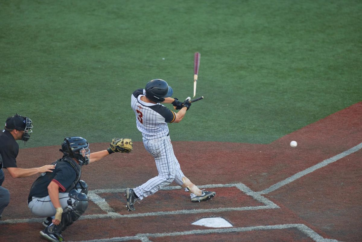 Ethan Hott, #3 of the Knights, breaking a bat in the top of the 7th inning during the Knights vs. Redmond Dudes game on July 17. The Knights earned a 12-2 victory over the Redmond Dudes