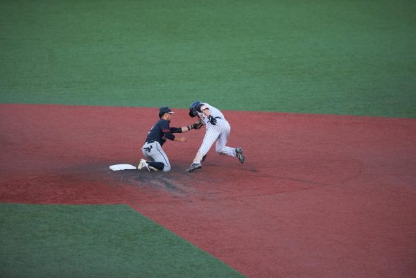 Ethan Hott, #3 of the Knights gets tagged out by a Redmond Dudes player in the bottom of the sixth inning during the Knights vs. Redmond Dudes game on July 17. The Knights earned a 6-0 victory over the Kelowna Falcons