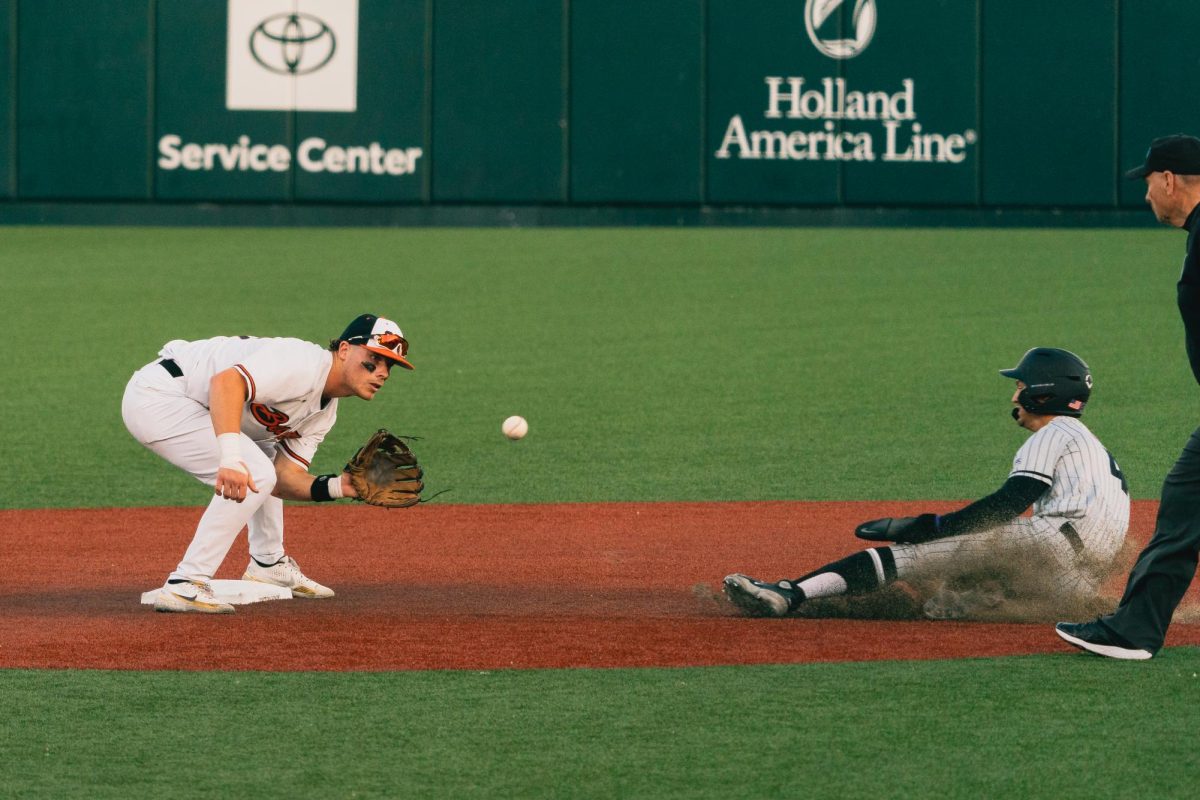 (#37) infielder Travis Bazzana tagging out a runner at second base against the University of Portland Pilots on May 16. The Beavers suffered a 14-8 loss against the Pilots. 