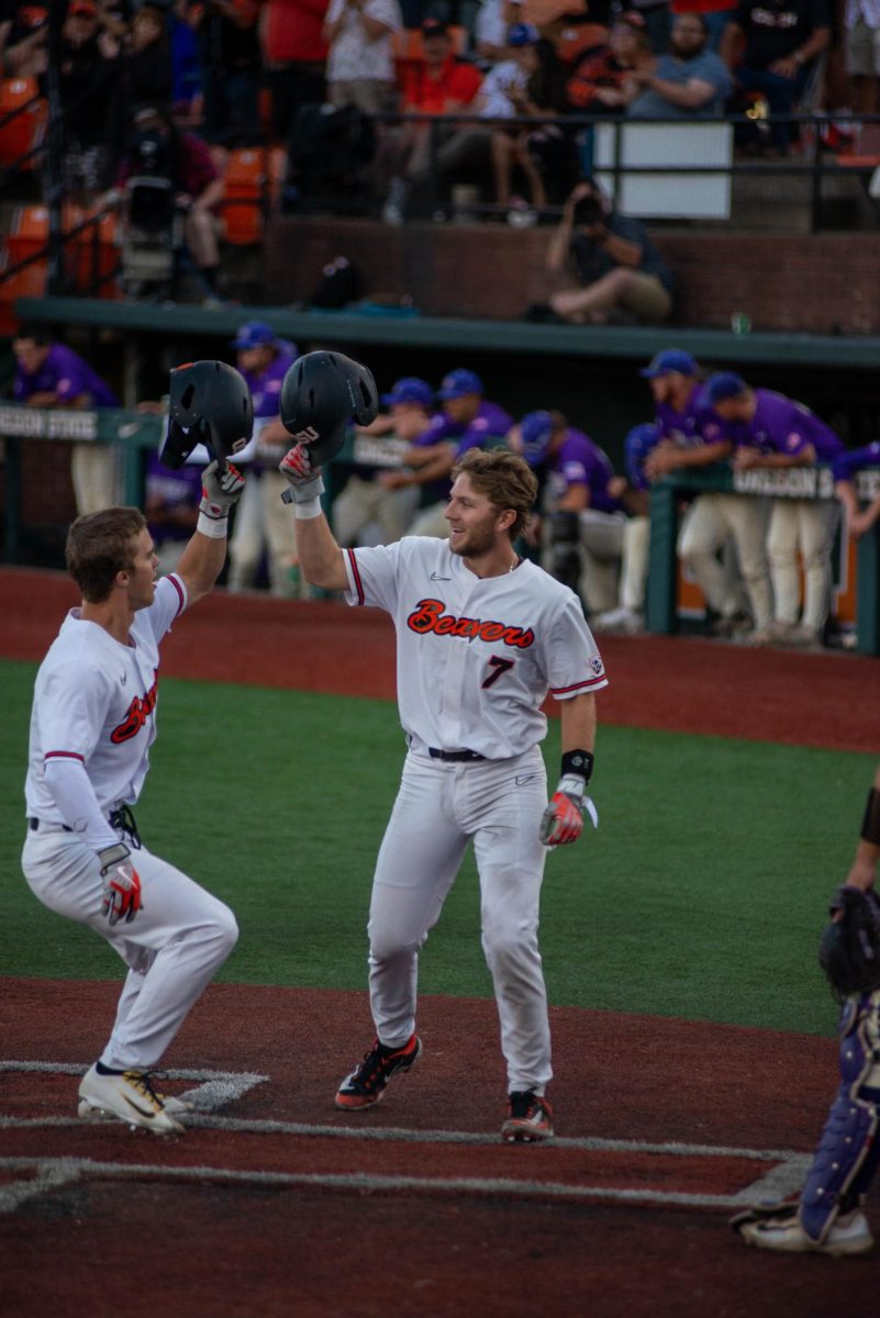Mikey Kane #7 (right) celebrates with #1 Gavin Turley after hitting a two-run home run against Western Carolina on May 19. Kane was drafted by the Chicago White Sox in the 17th round of the 2023 MLB Draft