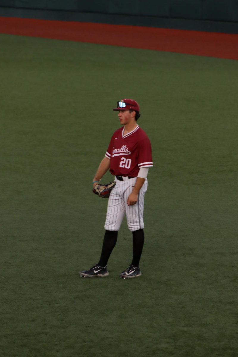 Corvallis Knights freshman outfielder Sam Stem stands alone in left field in the top of the seventh inning. Stem walked twice in 4 at-bats, also claiming a run, hit and RBI in the game as the Corvallis Knights defeated the Portland Pickles 7-4.
