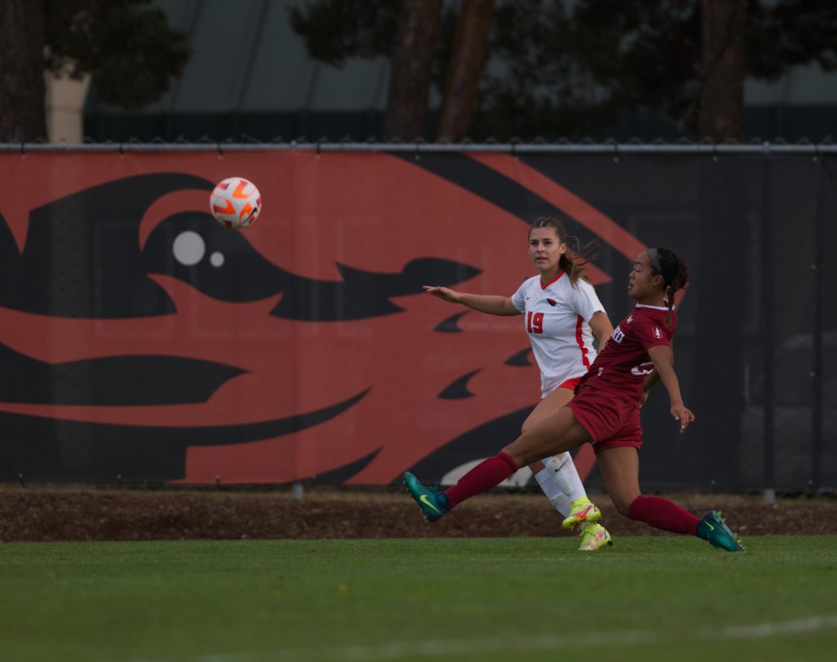 McKenna Martinez (left) and Stanfords Amy Sayer (right) face off in a match at Paul Lorenz Field on October 23rd 2022. Martinez scored a goal Oregon States 3-2 win over UC Irvine. 