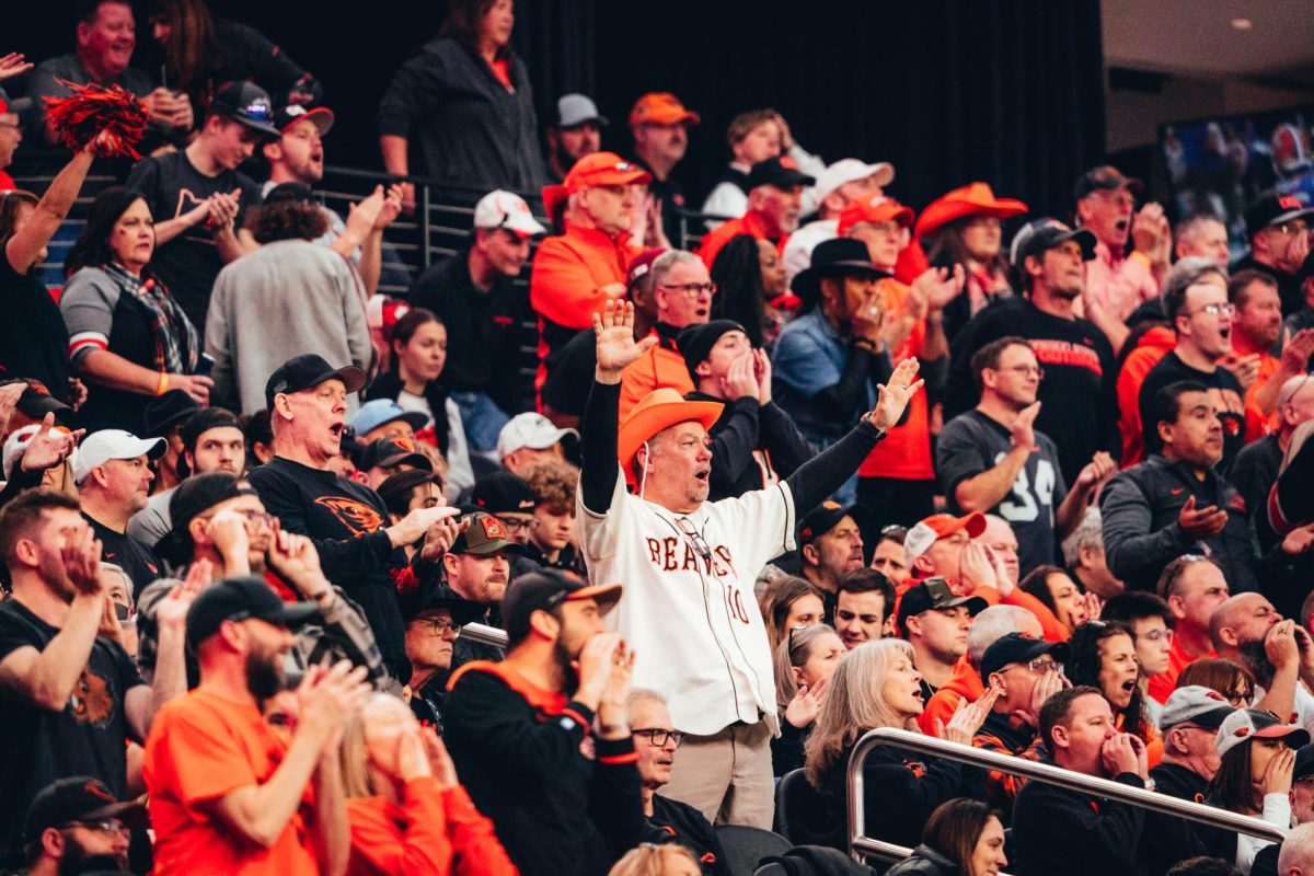 Beaver fans celebrating after a play at the Las Vegas Bowl at Allegiant Stadium on Dec. 18. The Beavers recorded 24 first downs in the game, compared to Floridas 13.