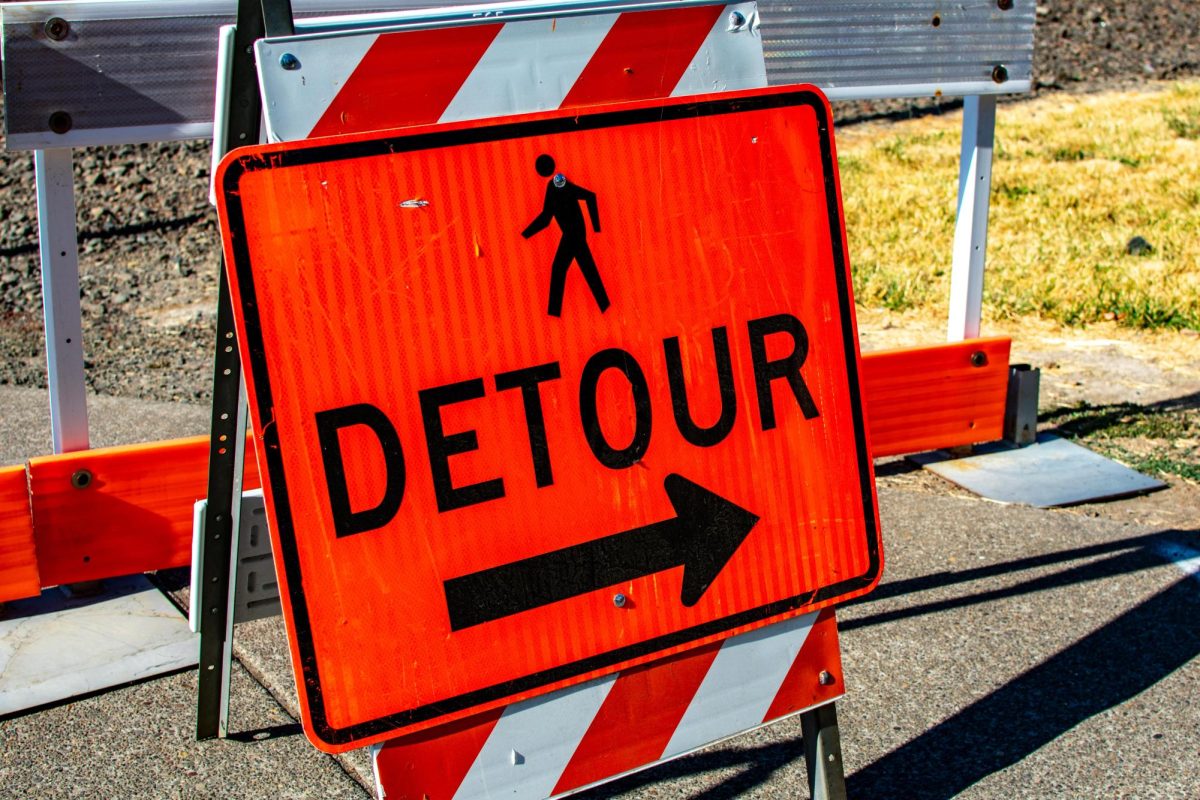 A detour sign sits at the crossing lane on the Oregon State University campus on July 12, 2023. OSU is working to deflate traffic for the football game on Sept. 29, 2023.