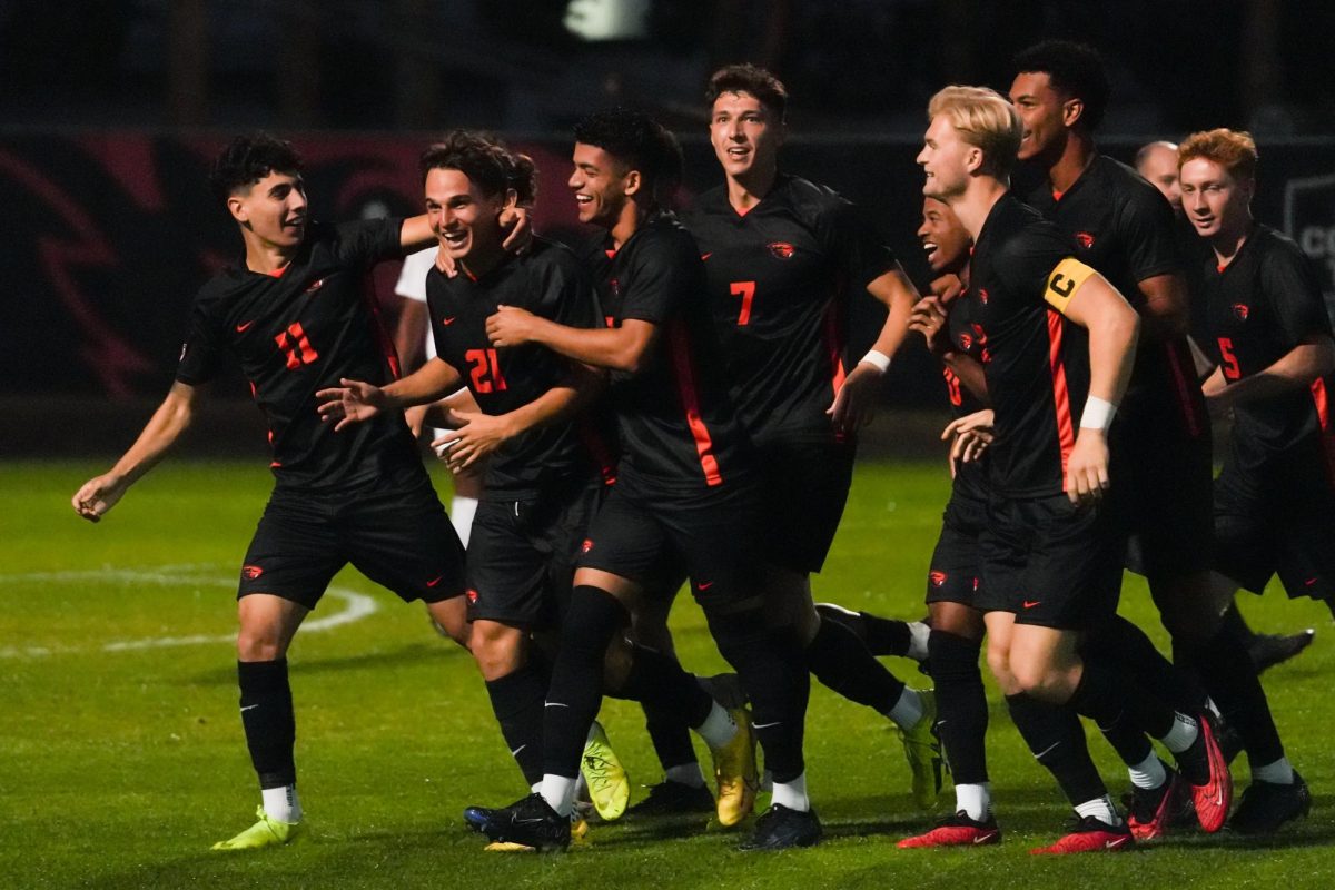 Oregon State junior midfielder Fabian Straudi (#21) leads the team in celebration at Paul Lorenz Field on October 5, 2023. Straudi scored the opening goal just 37 seconds into the match against UCLA. 