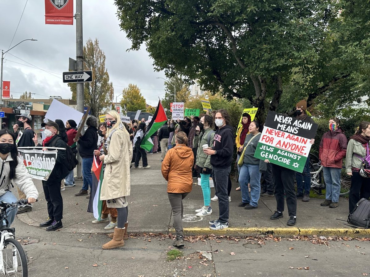 Over 100 protestors gathered in front of the Benton County Courthouse on Oct. 21. They carried signs with phrases like Free Palestine.