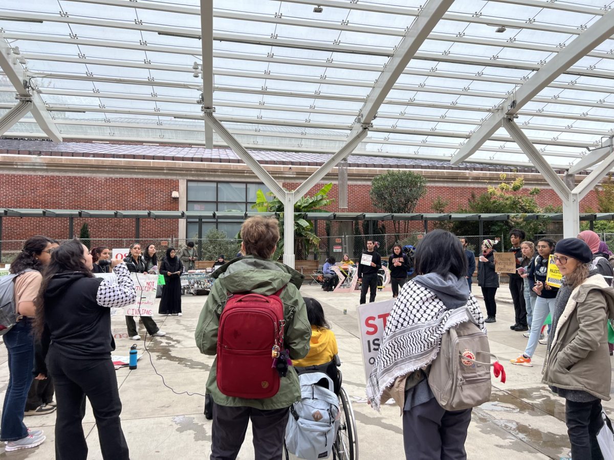 A group of students looking to re-establish the Student Union for Palestinian Equal Rights holds a demonstration in the Student Experience Center Plaza on Oct. 25, 2023. The students held signs and chanted in unison phrases like, Free, free Palestine.