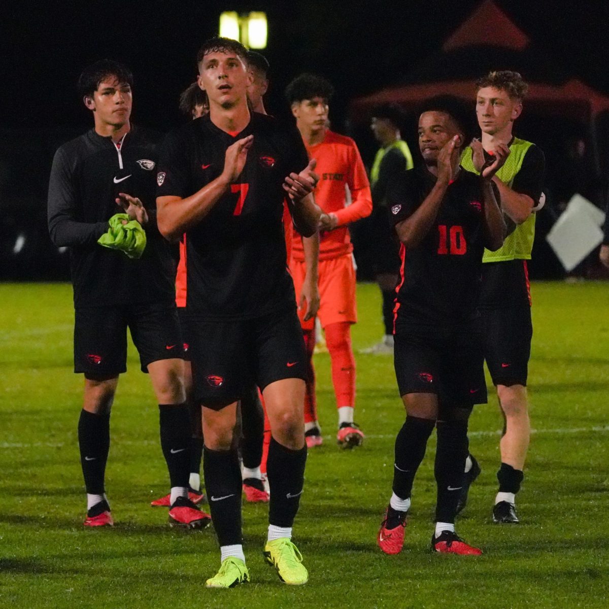 The Oregon State men’s soccer team applauds the crowd to show their appreciation. 
