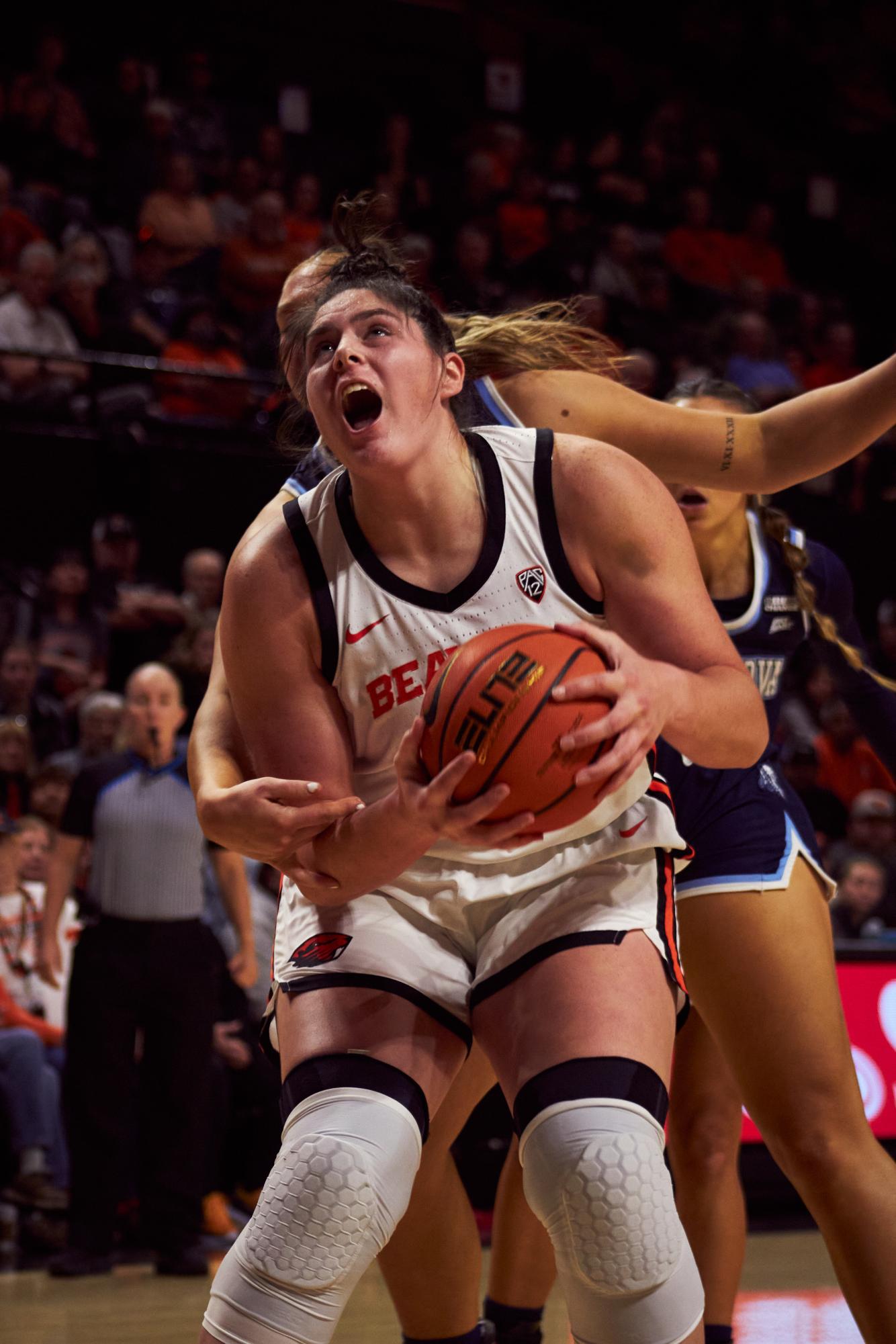 Forward Raegan Beers (#15) gets fouled going up for a layup in OSU’s 63-56 victory against the Villanova Wildcats in Gill Coliseum on Nov. 12, 2023.
