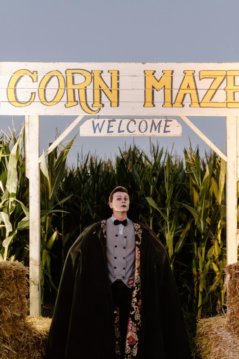Jeremy Price dresses as Count Dracula at the Melon Shack on October 5, 2023. Price was one of many costumed employees hidden in the haunted corn maze.