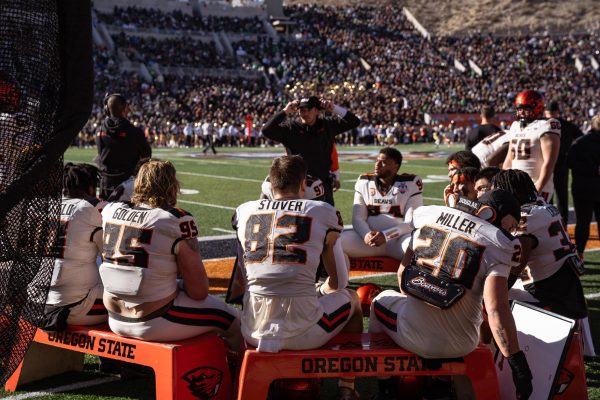  OSU Beavers huddle on the sidelines to discuss game strategy against Notre Dame at the Tony the Tiger Sun Bowl game in El Paso, TX on Dec 29, 2023.
