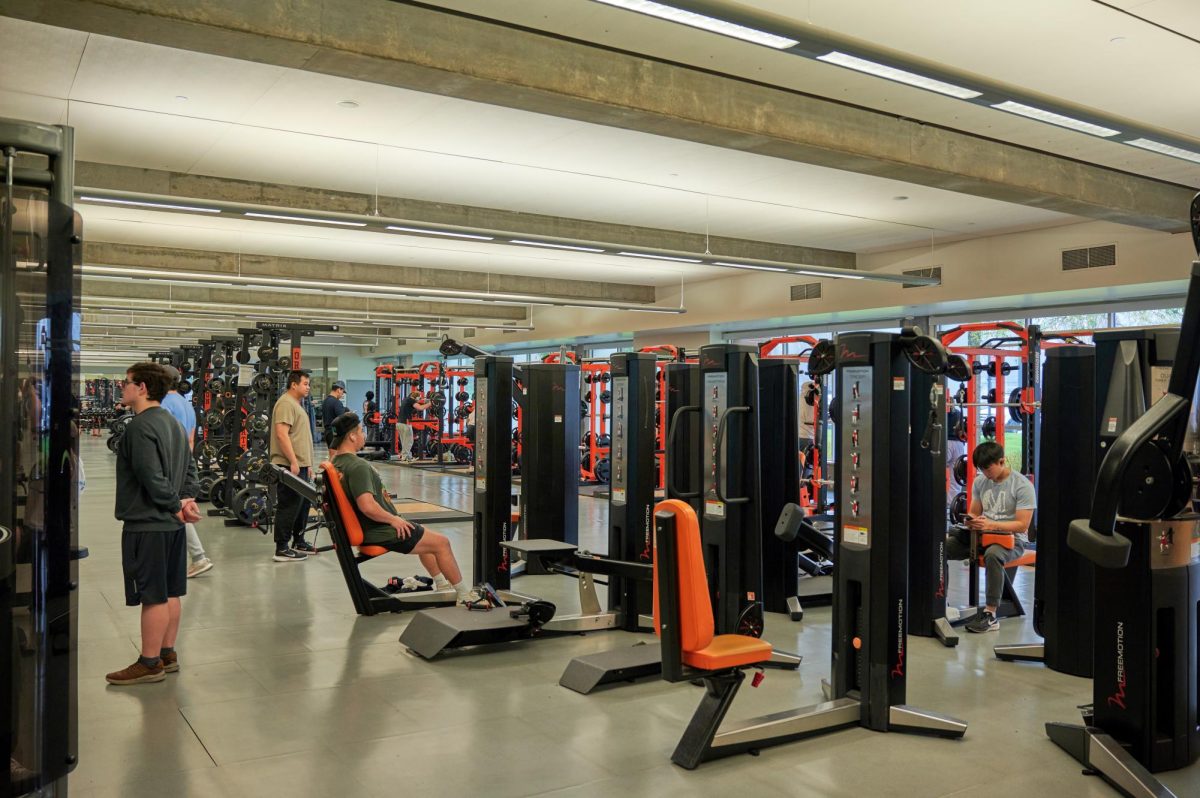 Oregon State University members work
out in Dixon Recreation Center on November 30.