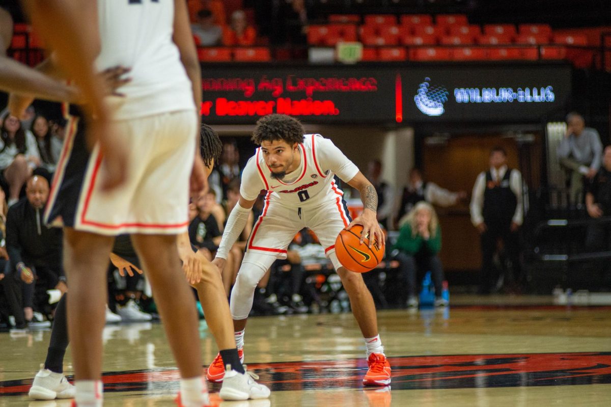 Sophomore guard Jordan Pope dribbles when the Oregon State mens basketball team faced off against the Cal Poly Mustangs in Gill Coliseum on December 4 at 7pm in a tough point for point battle.