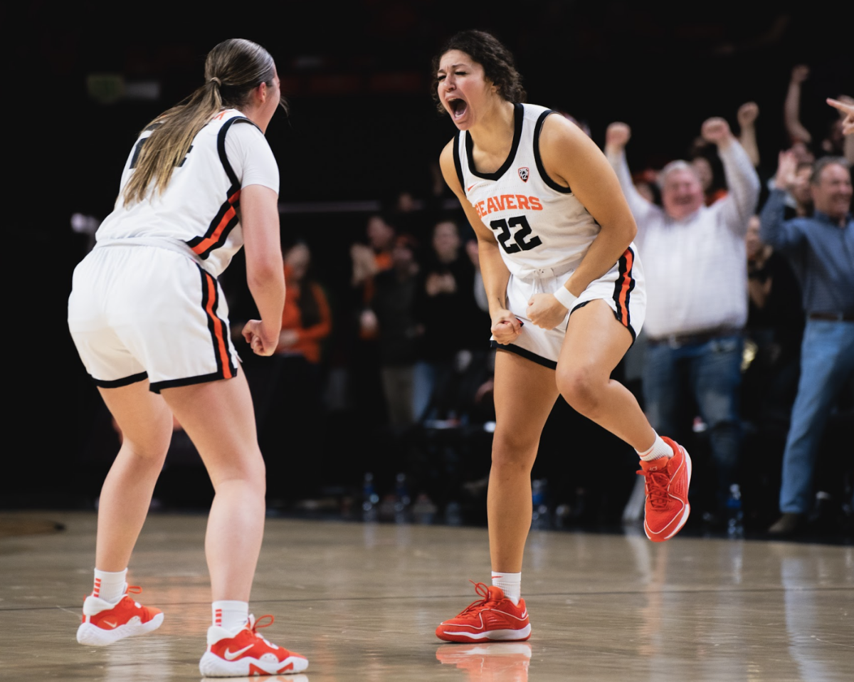Talia Von Oelhoffen celebrates with Adlee Blacklock after clinching victory against the University of Arizona Wildcats at Gill Coliseum in Corvallis on Jan. 12. 
