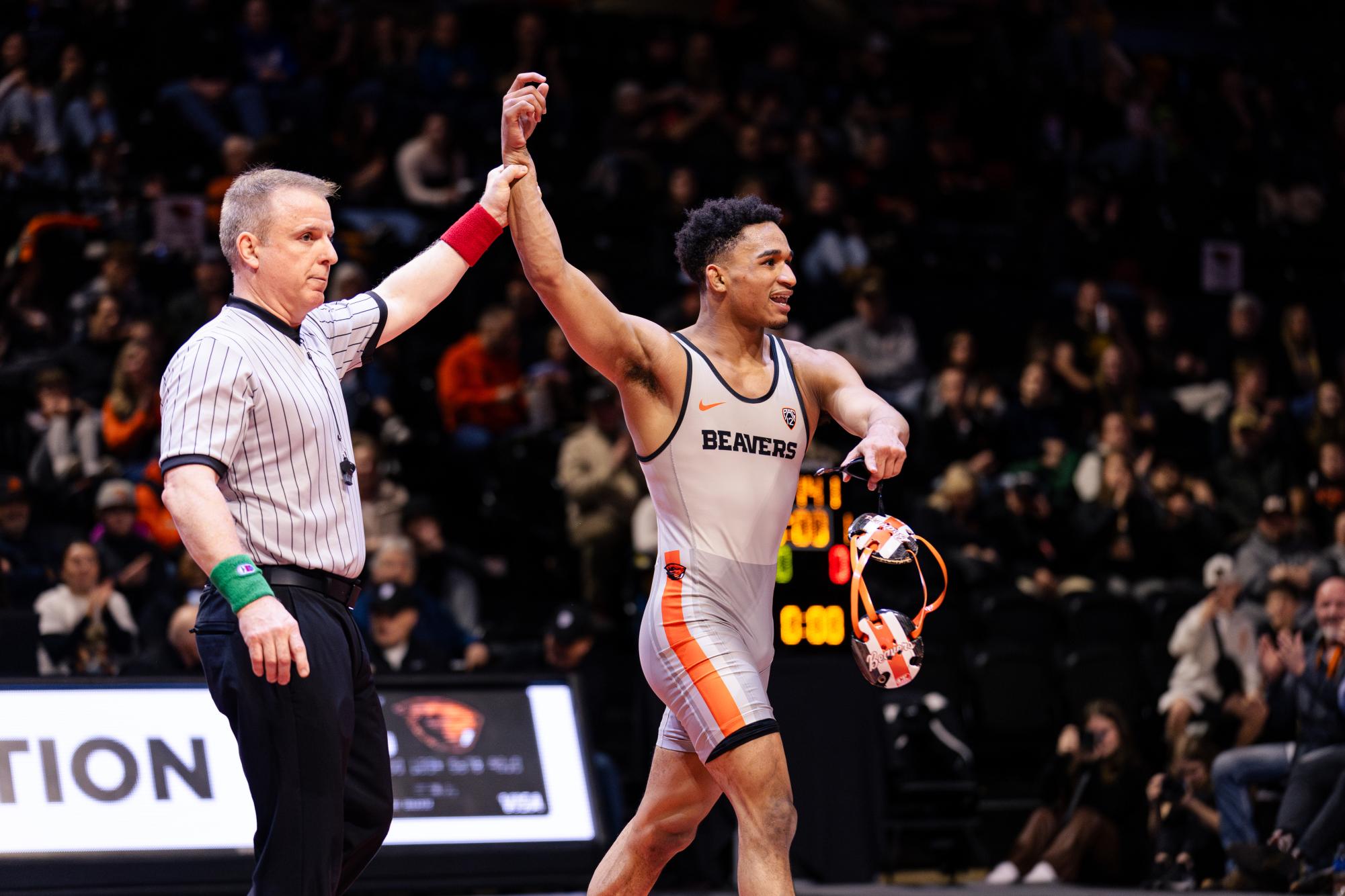 Cleveland Belton wins his match against his Cal Poly opponent Abe Hinrichsen at Gill Coliseum in Corvallis on Jan. 19.
