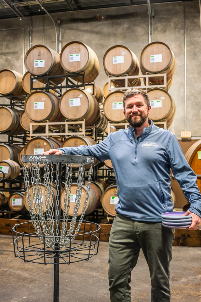 Professional Disc Golfer and 2017 United States Disc Golf Champion, Nate Sexton in the barrel room at the 2 Towns Ciderhouse Tap Room. Contributed by 2 Towns Cider