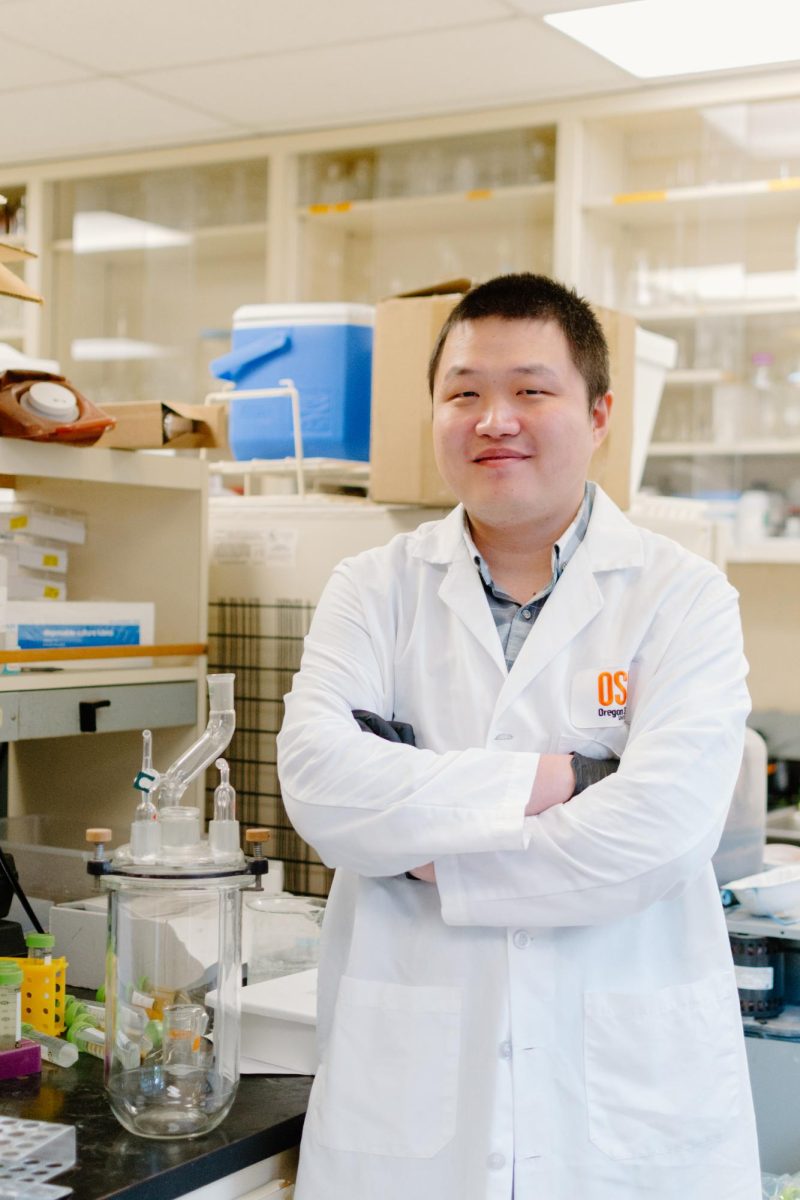 PhD student Fei Long (he/him) poses in Hong Liu’s lab on January 19, 2024.